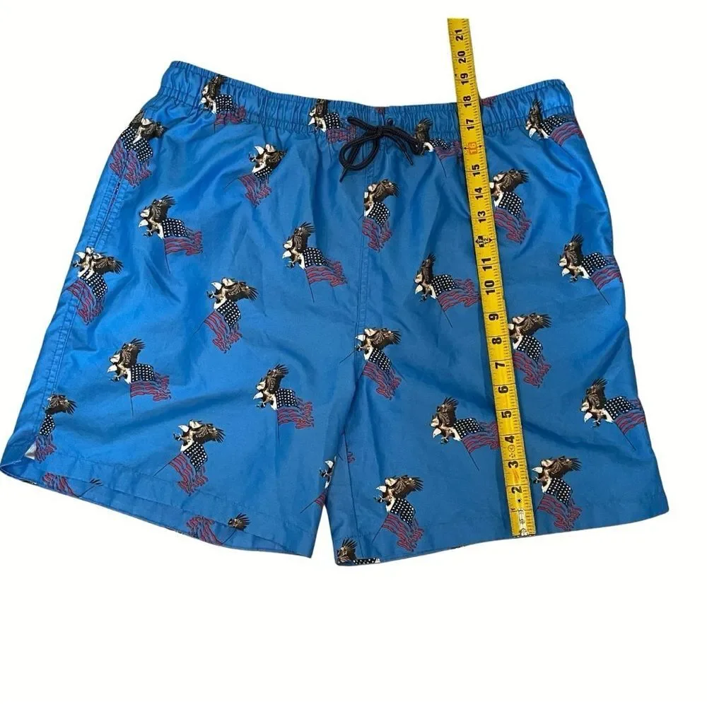 NEW! Wave Zone Blue Swim Shorts with Patriotic Eagle and Flag. NWOT. Men’s L